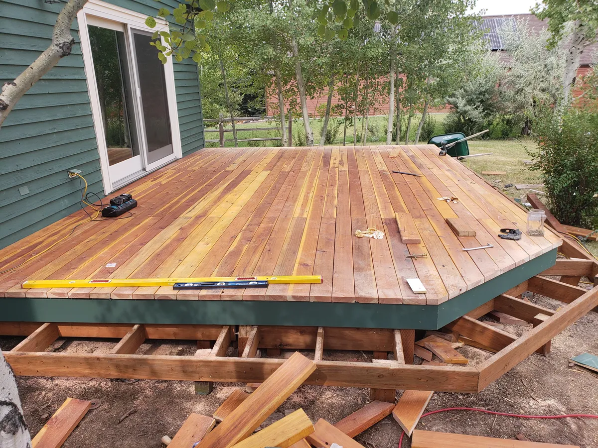 Completed multi-level cedar deck with angled corner on residential home in Bozeman