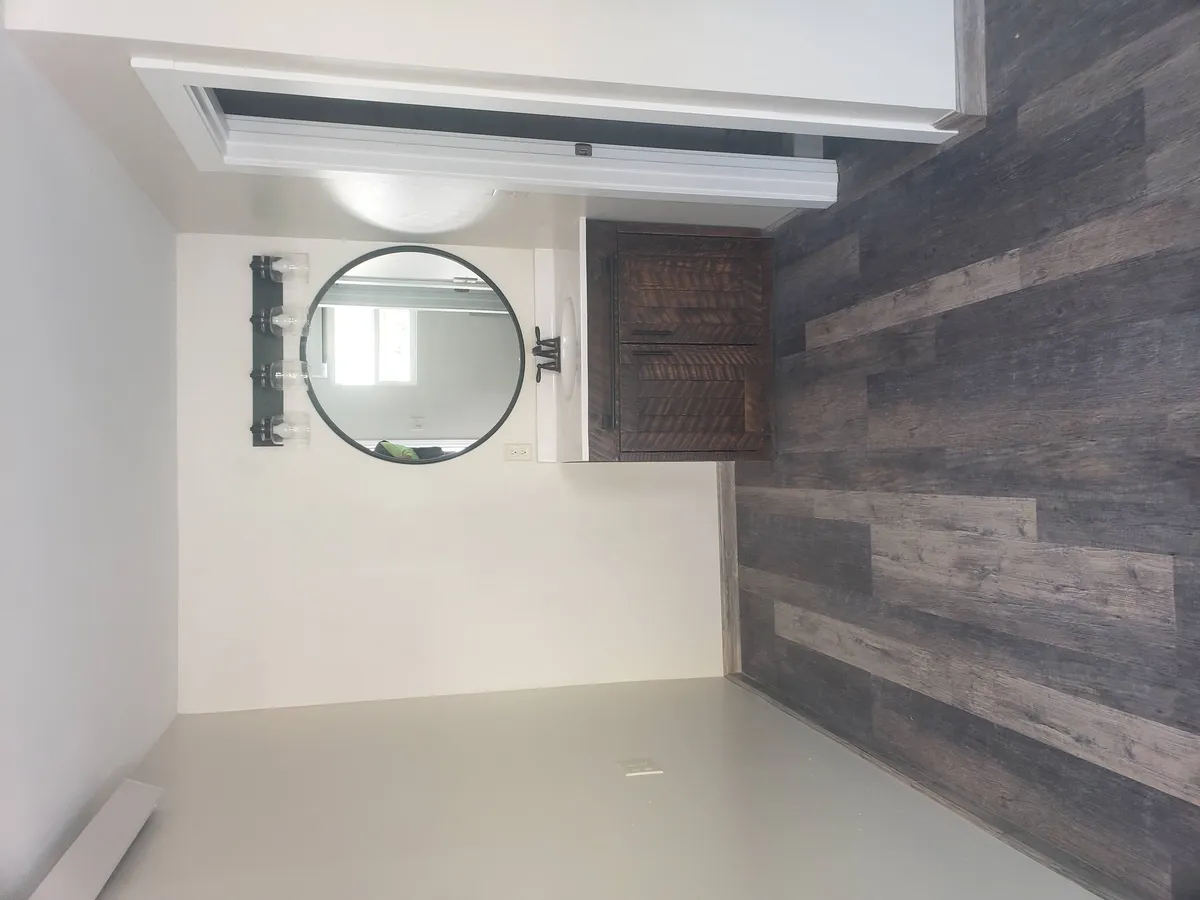Completed bathroom remodel in Bozeman with modern fixtures and tile work