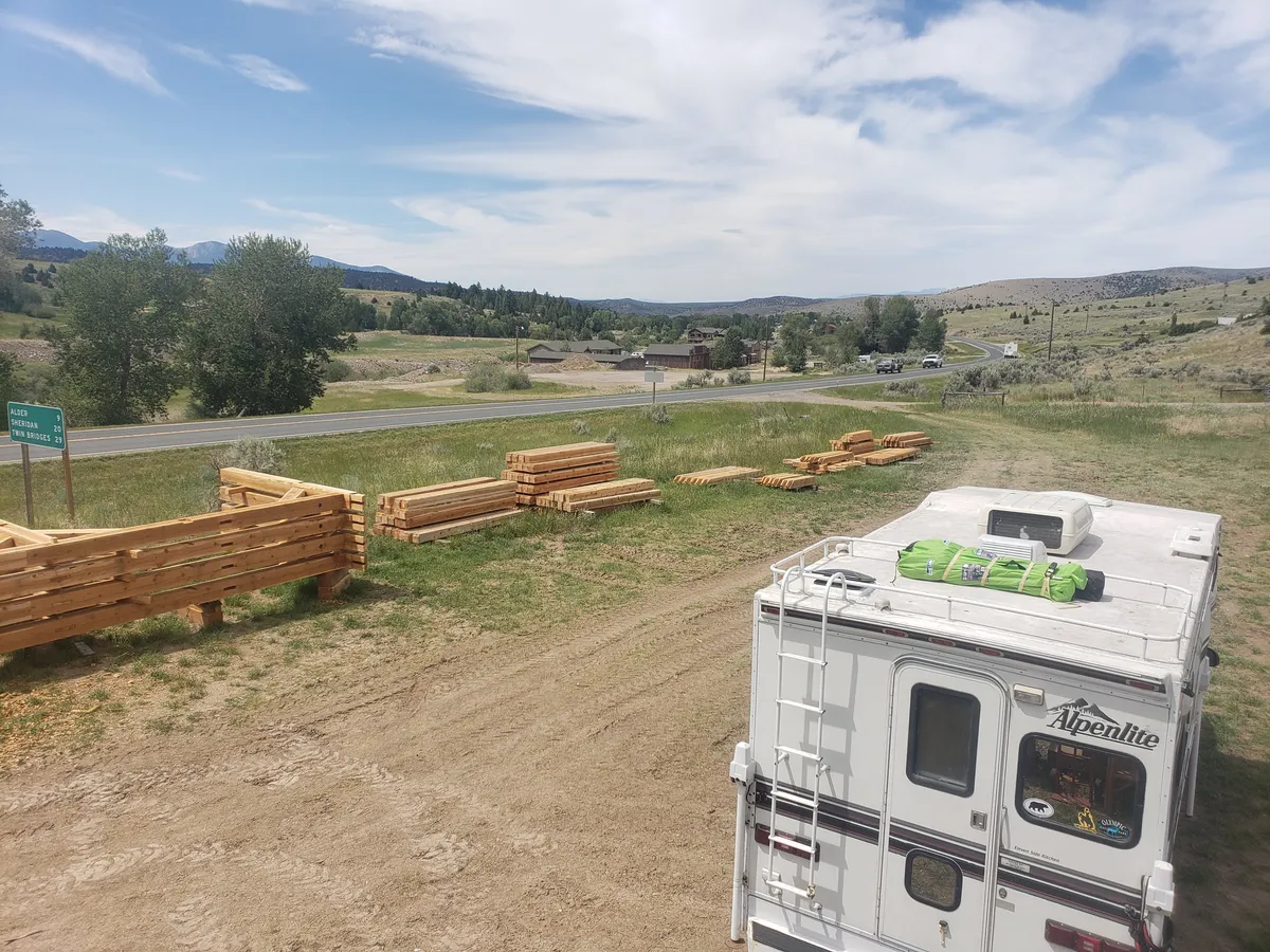 Large timber frame structure during raising